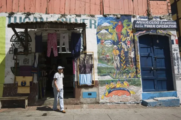 Framed Print : Clothing store and tour agency in this major tourist centre, Banos, Ambato Province Framed Print : Clothing store and tour agency in this major tourist centre, Banos, Ambato Province