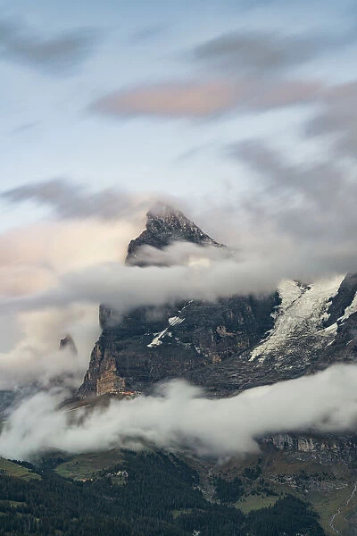 Clouds over Eiger mountain and green alpine valley, Murren, Lauterbrunnen