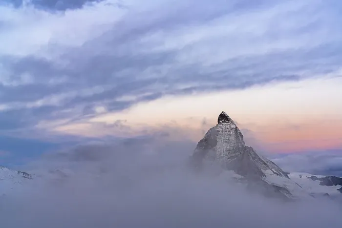 Framed Print : Clouds over Matterhorn peak emerging from mist at sunrise, Gornergrat, Zermatt, canton of Valais, Switzerland, Europe Framed Print : Clouds over Matterhorn peak emerging from mist at sunrise, Gornergrat, Zermatt, canton of Valais, Switzerland, Europe