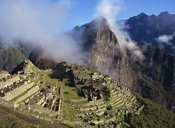 Clouds over the mountains behind the site of Machu Picchu, UNESCO World Heritage Site