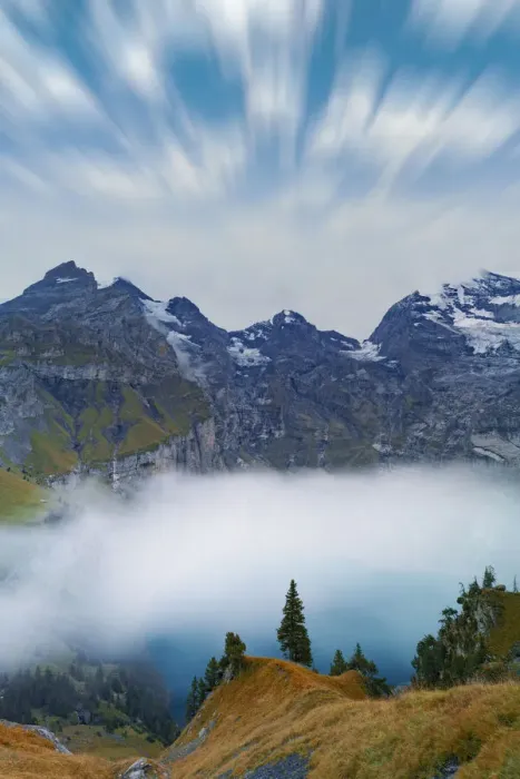 Framed Print : Clouds in the sky above lake Oeschinensee covered by fog, Bernese Oberland, Kandersteg Framed Print : Clouds in the sky above lake Oeschinensee covered by fog, Bernese Oberland, Kandersteg