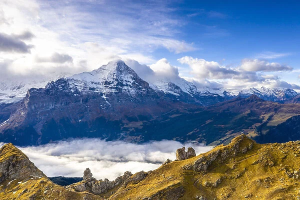 Cloudy sky over Mount Eiger seen from high mountains above Grindelwald in autumn