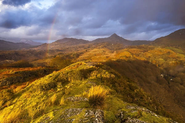 Cnicht under a rainbow at sunset, Snowdonia National Park, North Wales, Wales, United Kingdom