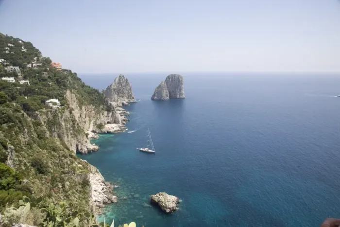 Framed Print : The coast line of the island of Capri, with the famous Faraglioni rocks on the back ground Framed Print : The coast line of the island of Capri, with the famous Faraglioni rocks on the back ground