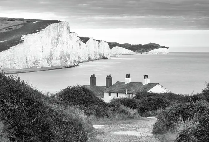Framed Print : Coastguard cottages at Cuckmere Haven, and Seven Sisters cliffs beyond, South Downs National Park, Seaford, East Sussex, England, United Kingdom Framed Print : Coastguard cottages at Cuckmere Haven, and Seven Sisters cliffs beyond, South Downs National Park, Seaford, East Sussex, England, United Kingdom