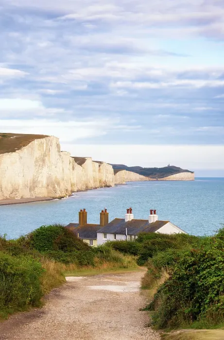 Framed Print : Coastguard cottages at Cuckmere Haven and Seven Sisters cliffs, South Downs National Park, Seaford, East Sussex, England, United Kingdom Framed Print : Coastguard cottages at Cuckmere Haven and Seven Sisters cliffs, South Downs National Park, Seaford, East Sussex, England, United Kingdom