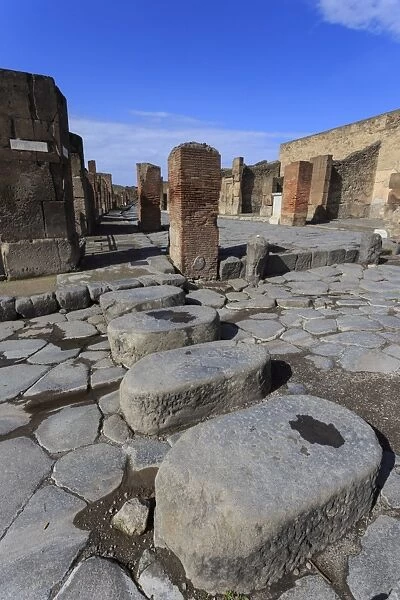 Cobbled street stepping stones, Roman ruins of Pompeii, UNESCO World Heritage Site