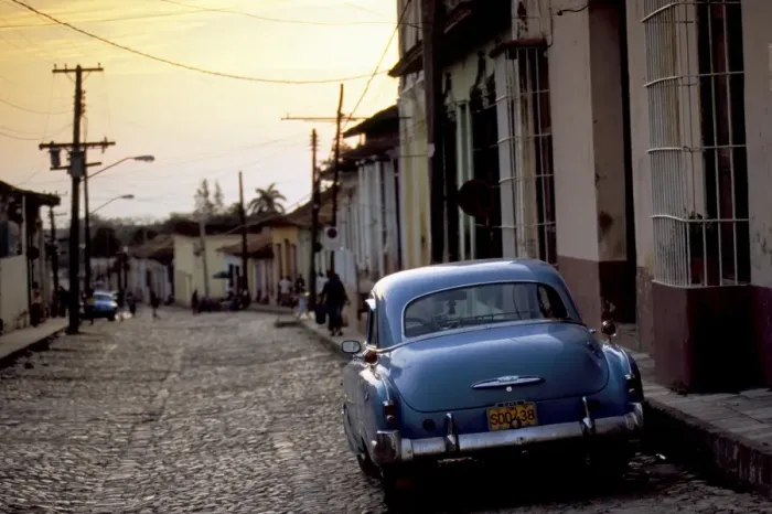Framed Print : Cobbled street at sunset with old American car, Trinidad, Sancti Spiritus province Framed Print : Cobbled street at sunset with old American car, Trinidad, Sancti Spiritus province