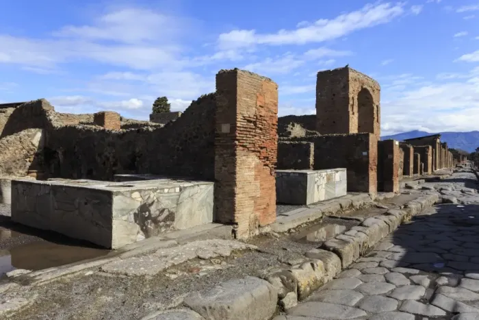 Framed Print : Cobbled street with thermopolium counters and arch, Roman ruins of Pompeii, UNESCO Framed Print : Cobbled street with thermopolium counters and arch, Roman ruins of Pompeii, UNESCO