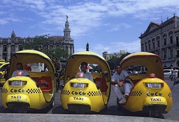 Coco taxi rank outside the Capitolio, Central Havana, Cuba, West Indies, Central America