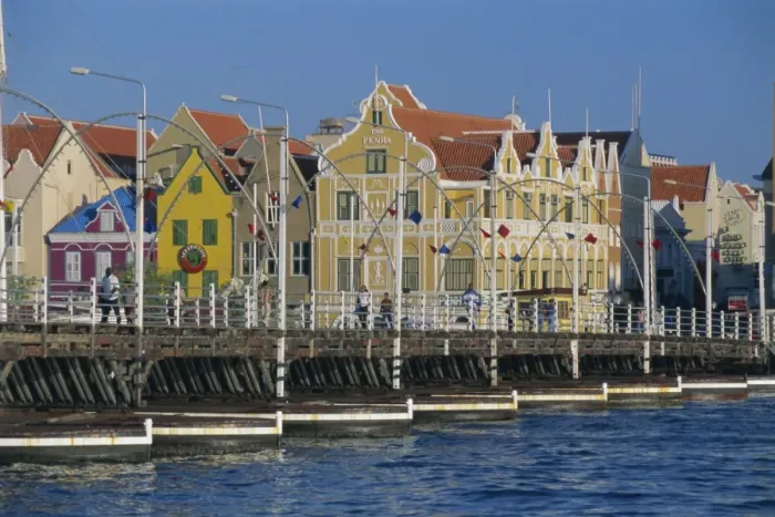 Framed Print : Colonial gabled buildings and the Queen Emma pontoon bridge, Willemstad Framed Print : Colonial gabled buildings and the Queen Emma pontoon bridge, Willemstad