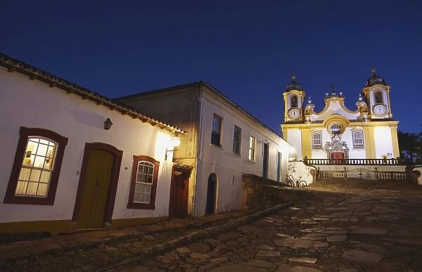 Colonial houses and Matriz de Santo Antonio Church at dusk, Tiradentes, Minas Gerais, Brazil, South America