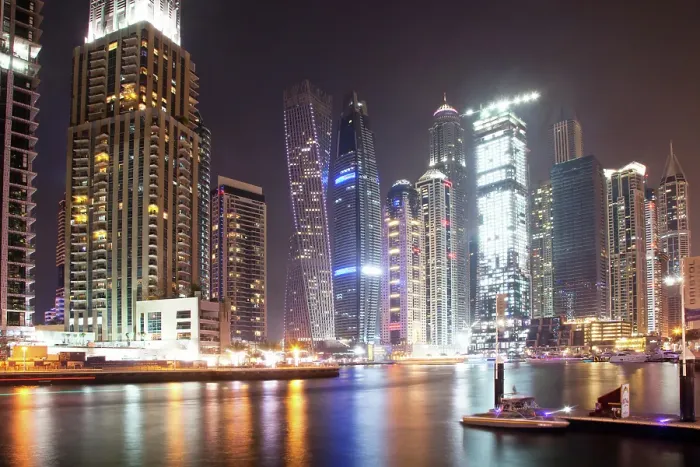 Framed Print : Colorful evening on canal and promenade in Dubai Marina, Dubai, United Arab Emirates Framed Print : Colorful evening on canal and promenade in Dubai Marina, Dubai, United Arab Emirates