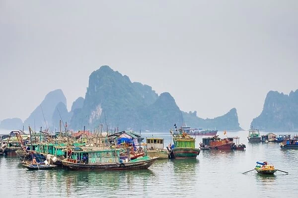 Colorful fishing boats in the harbor at Cai Rong, Quang Ninh Province, Vietnam, Indochina