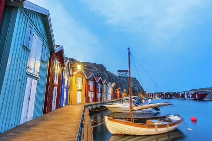 Framed Print : Colorful fishing huts with wooden boat moored at the jetty at dusk, Smogen, Bohuslan, Vastra Gotaland, West Sweden, Sweden, Scandinavia, Europe Framed Print : Colorful fishing huts with wooden boat moored at the jetty at dusk, Smogen, Bohuslan, Vastra Gotaland, West Sweden, Sweden, Scandinavia, Europe