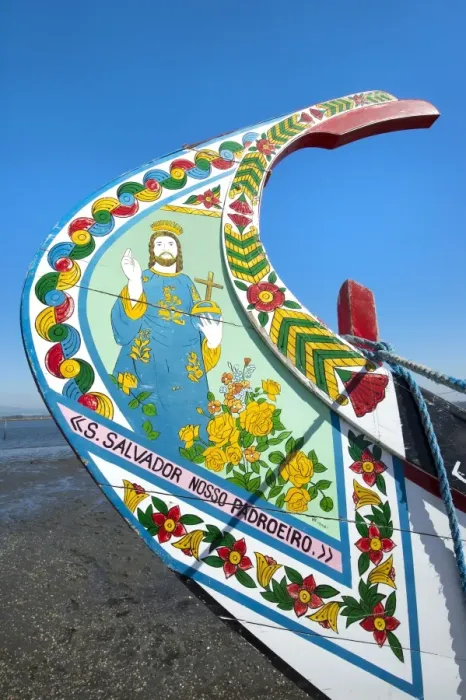 Framed Print : Colorful hand painted prow of a gondola-like moliceiro on the beach, Torreira, Aveiro, Beira, Portugal, Europe Framed Print : Colorful hand painted prow of a gondola-like moliceiro on the beach, Torreira, Aveiro, Beira, Portugal, Europe