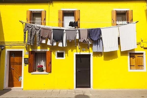 A colorful house on Burano, Venice, Veneto, Italy, Europe