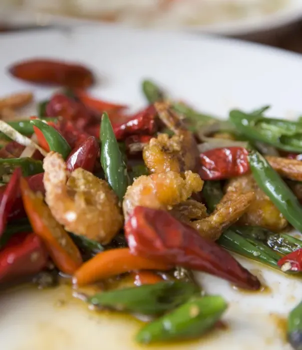 Framed Print : Colorful and spicy Sichuan cuisine shrimp dish uses both red and green chili peppers Framed Print : Colorful and spicy Sichuan cuisine shrimp dish uses both red and green chili peppers