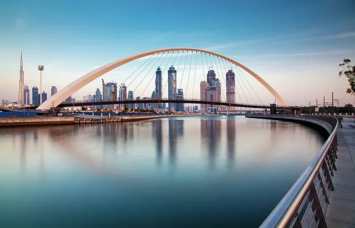 Framed Print : Colorful sunset over Dubai Downtown skyscrapers and newly built Tolerance bridge viewed from Dubai water canal, Dubai, United Arab Emirates Framed Print : Colorful sunset over Dubai Downtown skyscrapers and newly built Tolerance bridge viewed from Dubai water canal, Dubai, United Arab Emirates