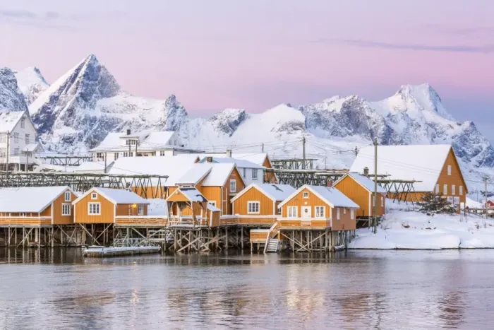 Framed Print : The colors of dawn frame the fishermens houses surrounded by frozen sea, Sakrisoy Framed Print : The colors of dawn frame the fishermens houses surrounded by frozen sea, Sakrisoy