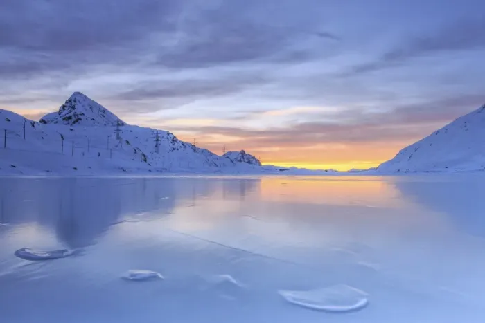 Framed Print : The colors of dawn invading the smooth surface of Lago Bianco exceptionally icy, Bernina Pass, Graubunden, Swiss Alps, Switzerland, Europe