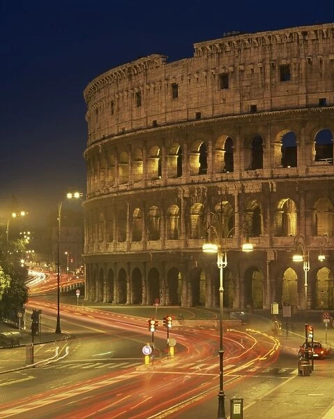 The Colosseum illuminated at night in Rome, Lazio, Italy, Europe