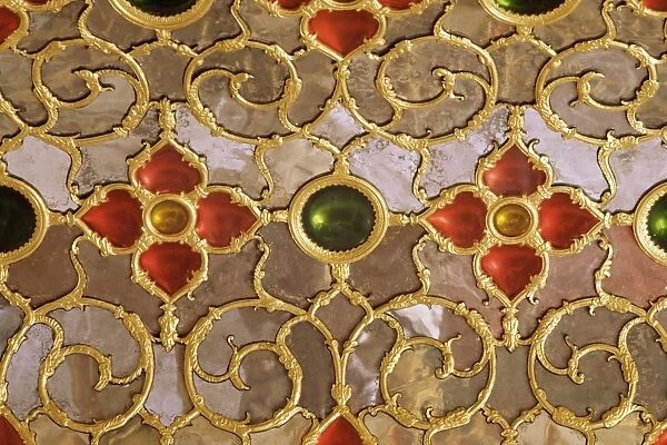 Detail of the coloured glass and mirror work in the