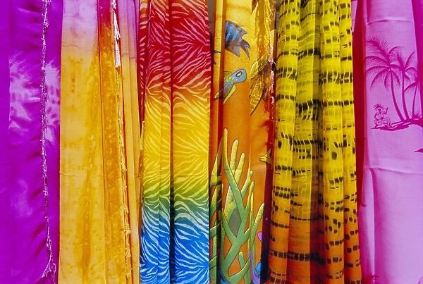 Colourful clothes hanging in a shop, St