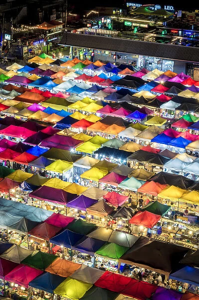 Colourful food stalls and tents at the Ratchada Night Train Market in Bangkok, Thailand