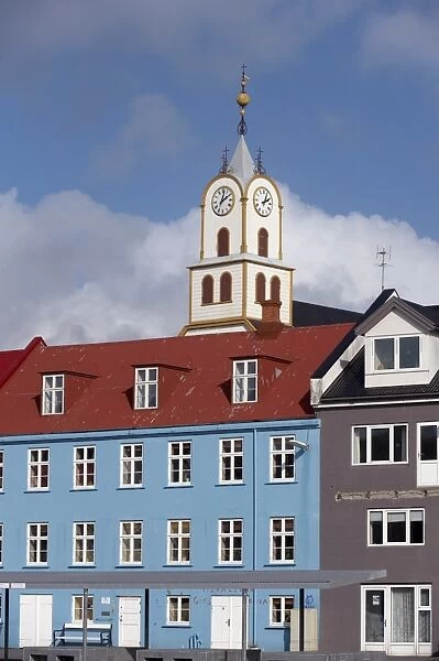 Colourful gabled buildings and Havnar Kirkja (Torshavns cathedral) along the quayside in Vestaravag harbour, Torshavn, Streymoy, Faroe Islands (Faroes)