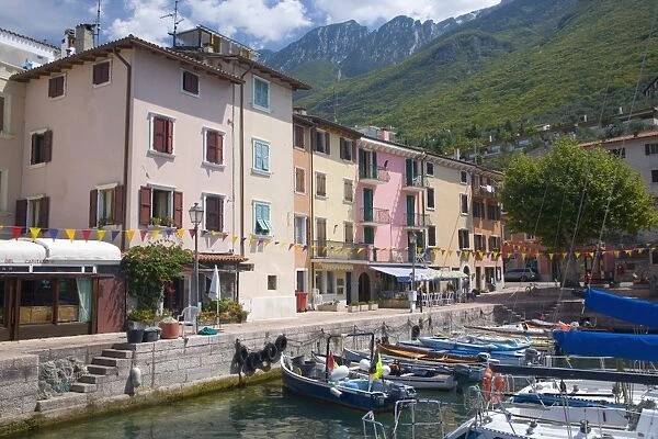 Colourful harbourside houses in the village of Brenzone on the eastern shore of Lake Garda