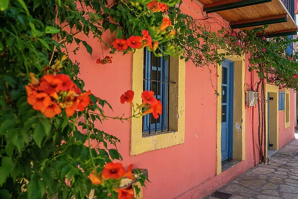 Colourful house in Fiskardo harbour, Fiskardo, Kefalonia, Ionian Islands, Greek Islands, Greece, Europe