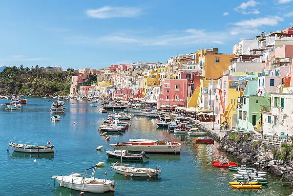 Colourful houses and boats at Marina Corricella, Procida island, Naples bay, Naples province, Phlegraean islands, Campania region, Italy, Europe