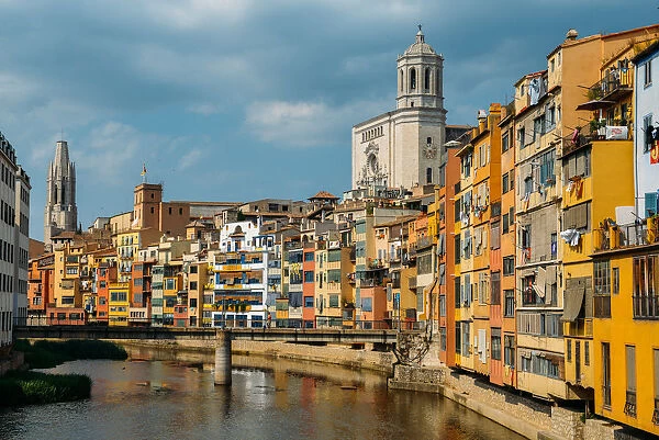 Colourful houses on the embankment of the River Onyar in historic centre with Girona s