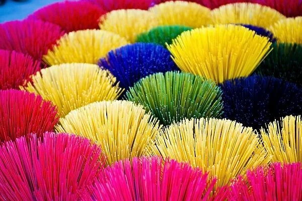 Colourful multicoloured incense sticks in Hue, Vietnam, Indochina, Southeast Asia, Asia
