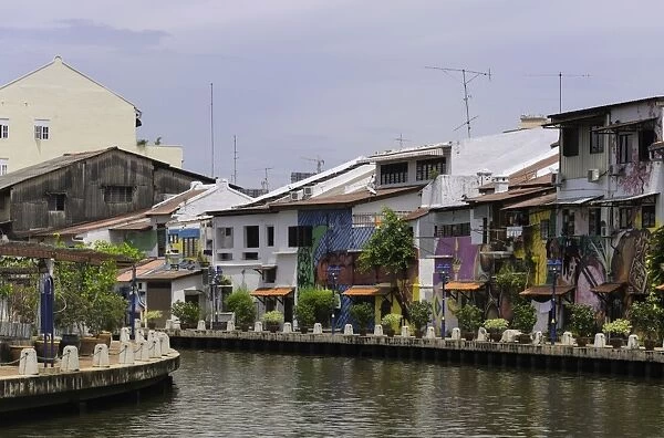 Colourful murals on houses along the Melaka River in Melaka (Malacca), Malaysia, Southeast Asia