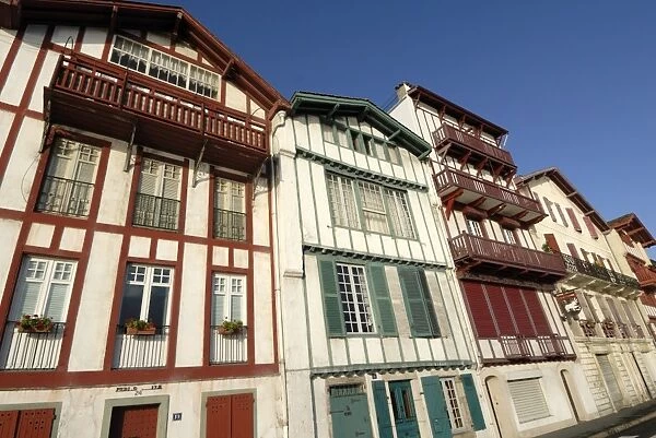 Colourful old houses along harbour of Ciboure, near St. Jean de Luz, Pyrenees Atlantique