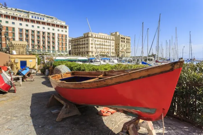Framed Print : Colourful rowing boats under repair at the marina Borgo Marinaro, with backdrop of grand hotels Framed Print : Colourful rowing boats under repair at the marina Borgo Marinaro, with backdrop of grand hotels