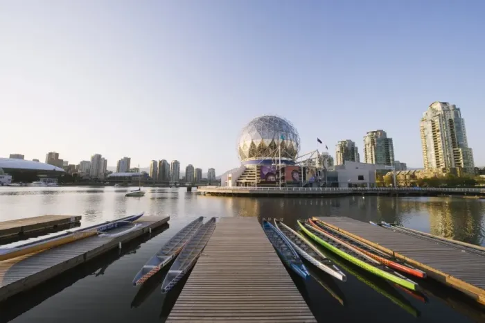 Framed Print : Colourful rowing boats in front of Telus Science World, on False Creek