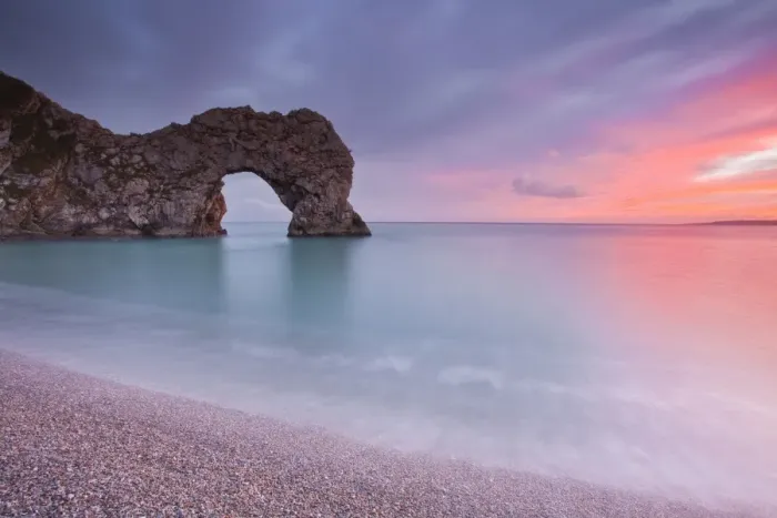 Framed Print : A colourful sunset over Durdle Door on the Jurassic Coast, UNESCO World Heritage Site, Dorset, England, United Kingdom, Europe Framed Print : A colourful sunset over Durdle Door on the Jurassic Coast, UNESCO World Heritage Site, Dorset, England, United Kingdom, Europe