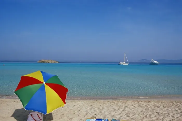Framed Print : Colourful umbrella on Playa de ses Illetes beach Framed Print : Colourful umbrella on Playa de ses Illetes beach