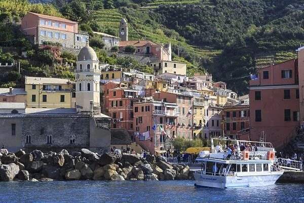 Colourful village houses, churches and ferry, Vernazza, Cinque Terre, UNESCO World Heritage Site