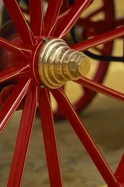 Colourful wheel of horse-drawn carriage