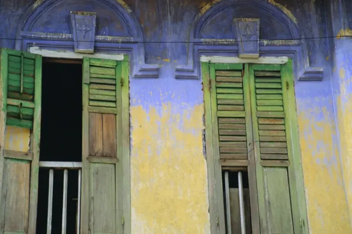 Framed Print : Colourful window shutters in an old builing Framed Print : Colourful window shutters in an old builing