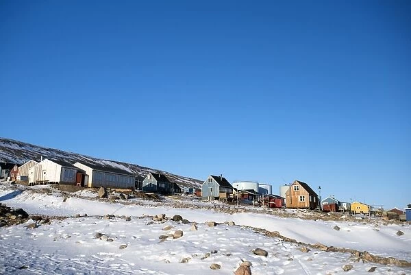 Colourful wooden houses in the village of Qaanaaq, one of the most northerly human