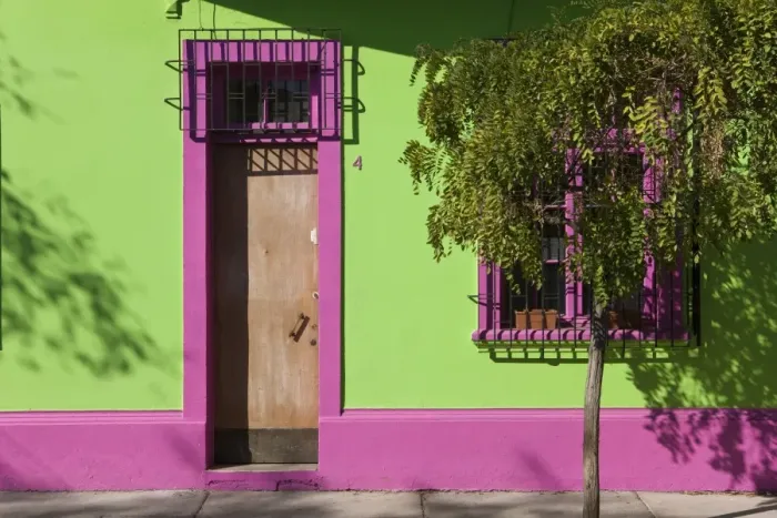 Framed Print : Colourfully painted housefronts in the trendy district of Barrio Bellavista Framed Print : Colourfully painted housefronts in the trendy district of Barrio Bellavista