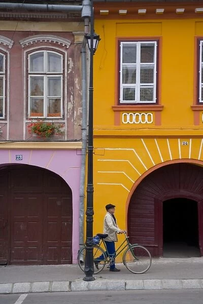 Detail of colourfully painted houses in medieval citadel town, Sighisoara