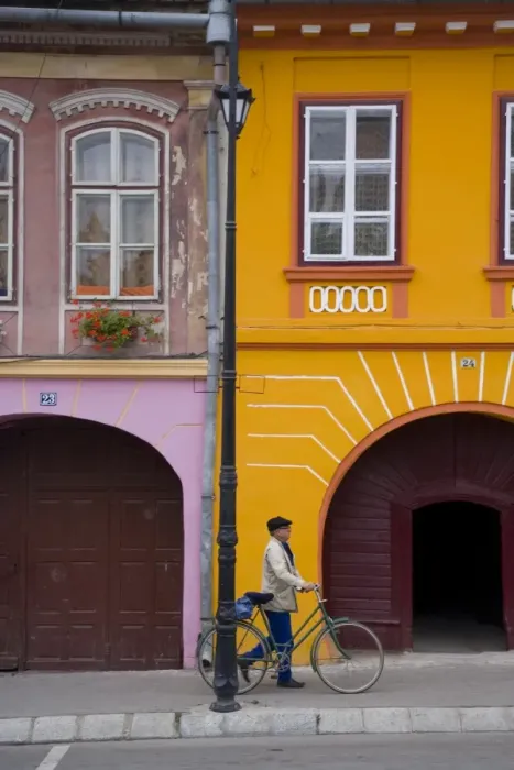 Framed Print : Detail of colourfully painted houses in medieval citadel town, Sighisoara Framed Print : Detail of colourfully painted houses in medieval citadel town, Sighisoara