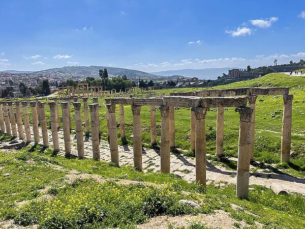 Columns line a street in the ancient city of Jerash, believed to be founded in 331 BC by Alexander the Great, Jerash, Jordan, Middle East