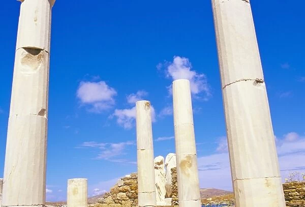 Columns surrounding ancient statues of Cleopatra and Diocrides